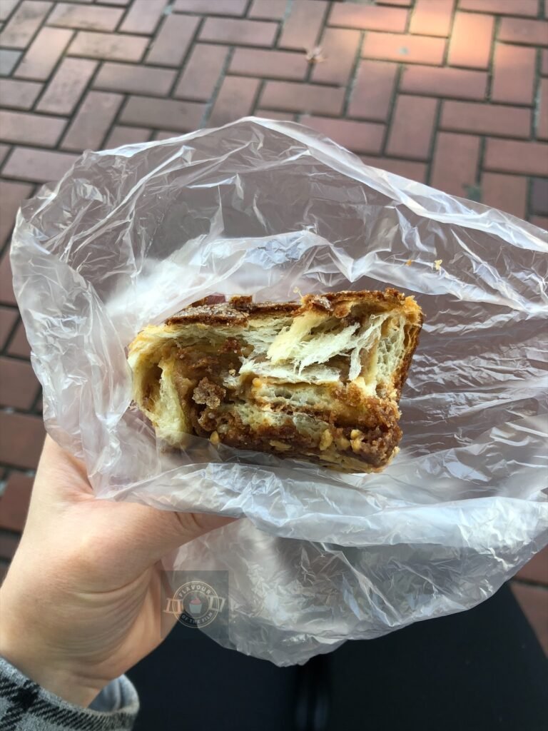 The inside of the cinnamon bun from Vie de France, which is layers of fluffy bread with cinnamon, brown sugar and butter running through.