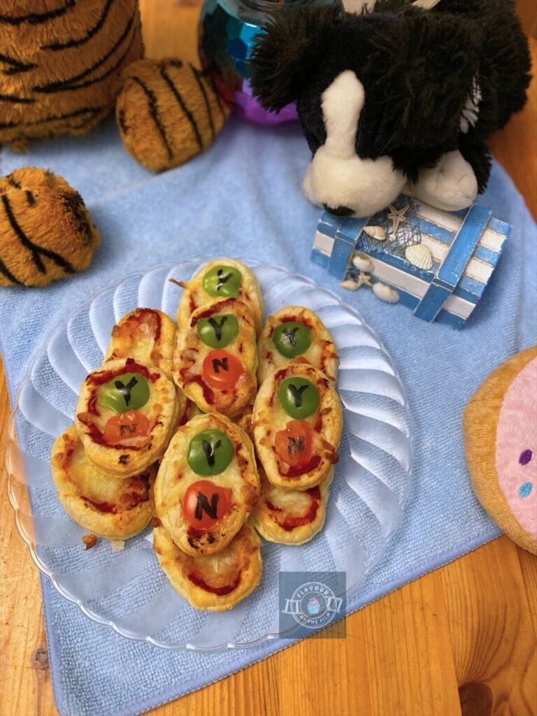 Bluey inspired yes/no button mini pizzas.