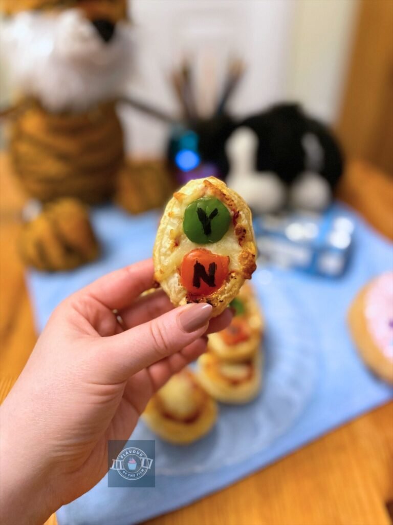 Bluey inspired yes/no button mini pizzas.