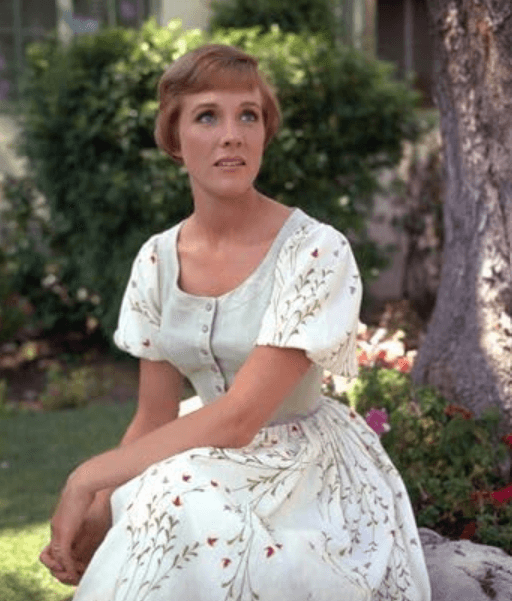 Julie Andrews in a floral spring dress.