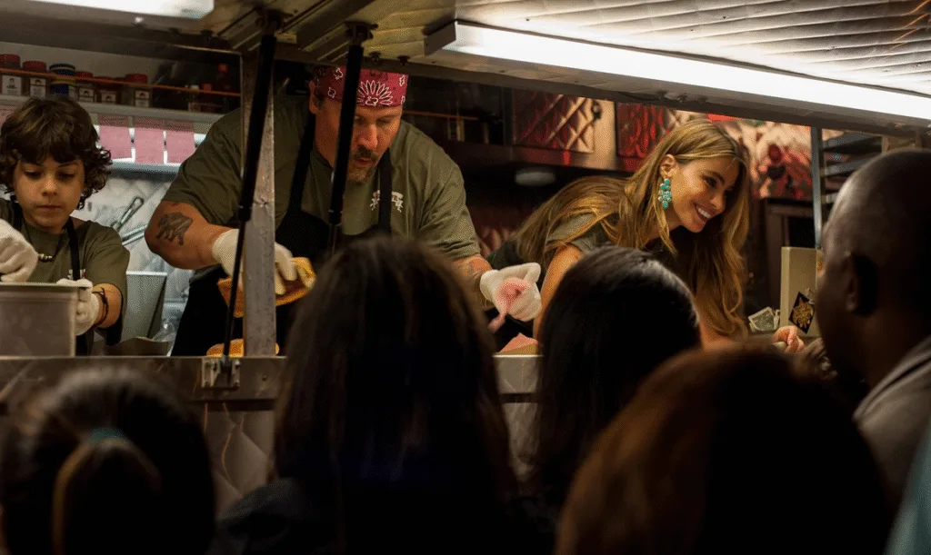 The main characters serving customers from their food truck.