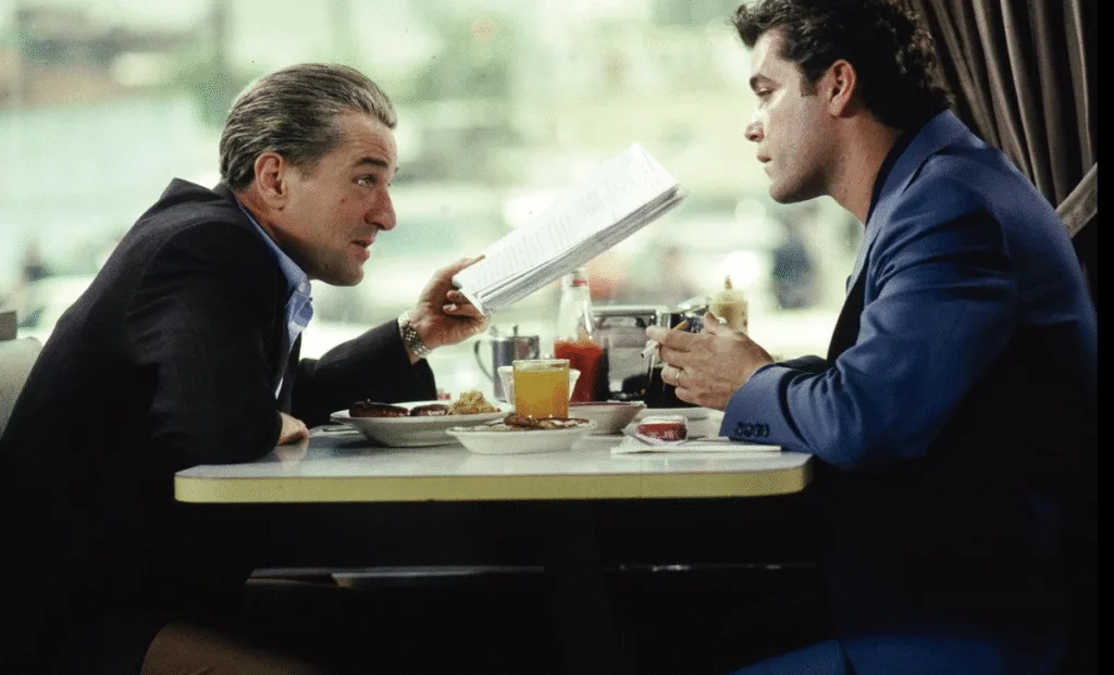 Lead characters having an important discussion over food.