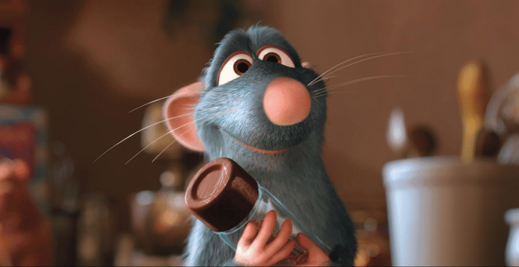 Remy hugging a bottle of spice.