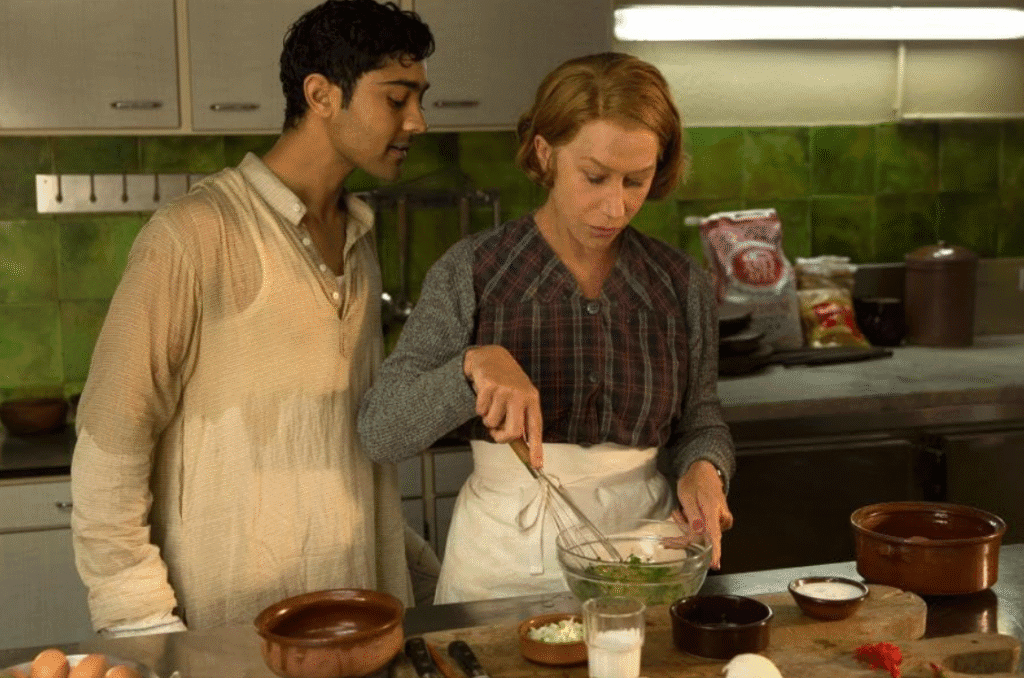 The lead characters cooking together.