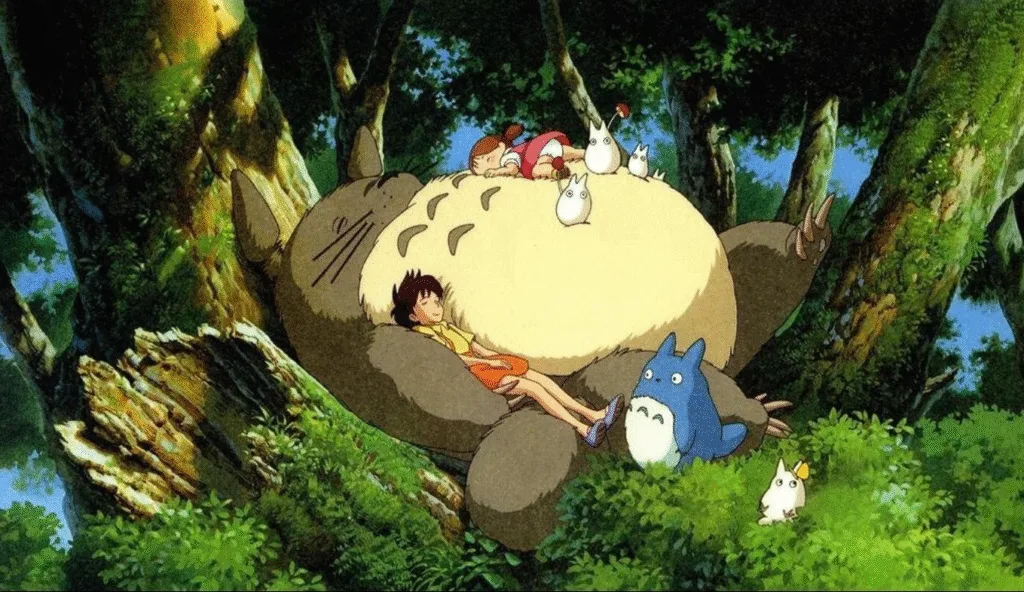 Totoro and the girls having a nap together.