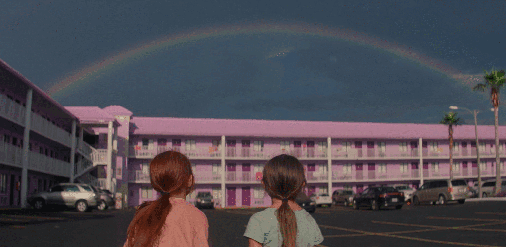 A rainbow over the motel while Moonee and her friend admire it.