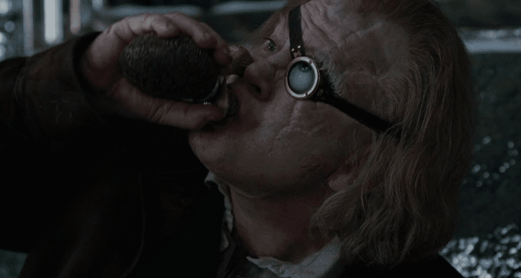 Barty Crouch Jr. as Moody drinking from his flask during the yule ball.