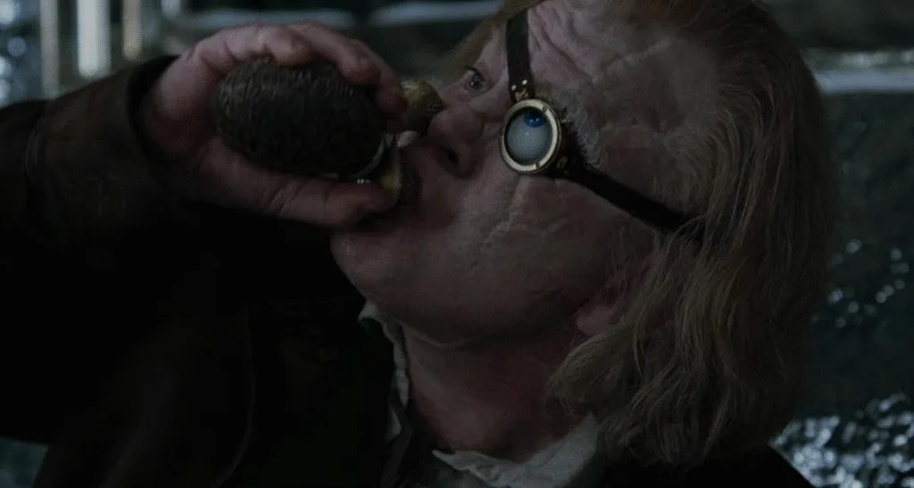 Barty Crouch Jr. as Moody drinking from his flask during the yule ball.