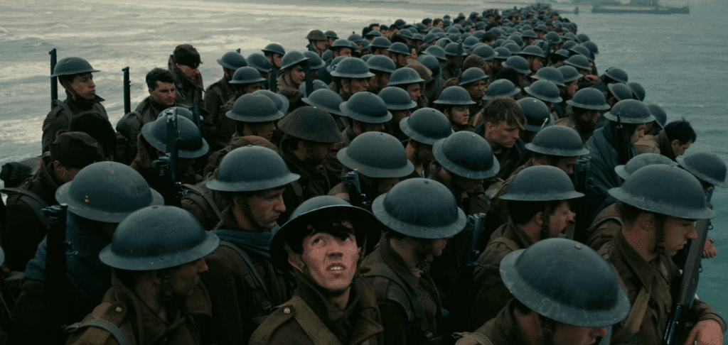 Soldiers packed into boats heading for the beaches.