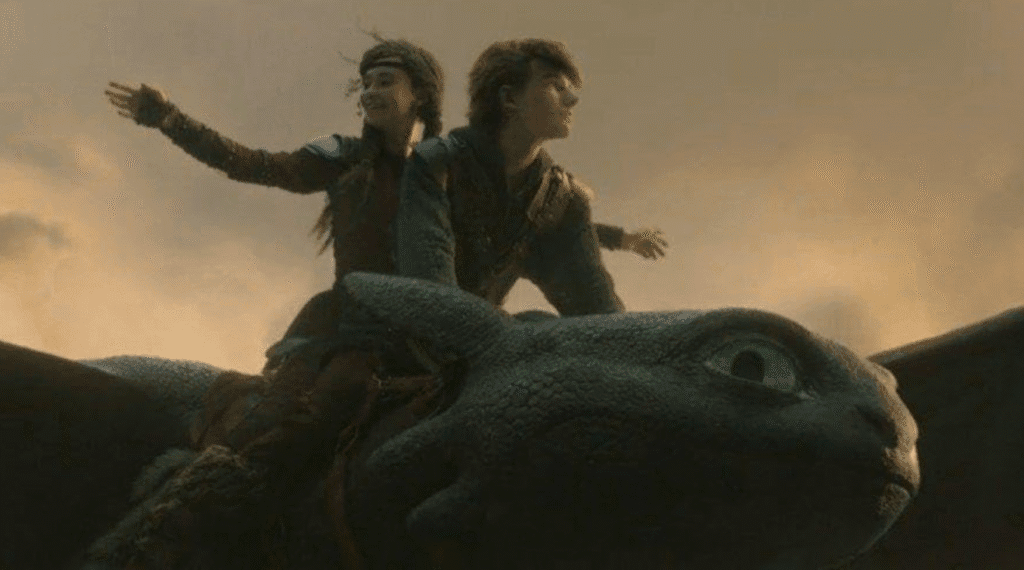 Hiccup and Astrid flying on Toothless.