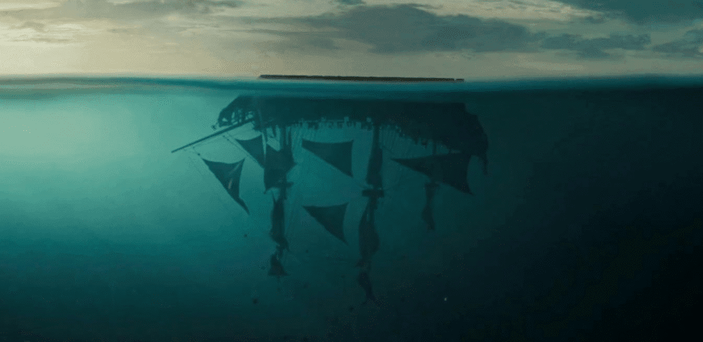 Ship upside down in the ocean.